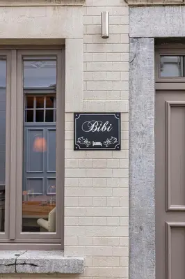 a sign on the side of a building at Bibi Tongeren in Tongeren
