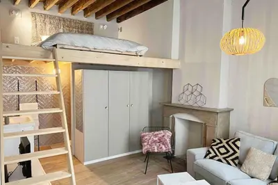 a living room with a bunk bed and a couch at Maison avec 4 suites & Rooftop en plein centre ville - Place Saint Paul in Liège
