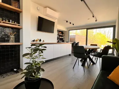 a kitchen and dining room with a table and chairs at Inova - Comfort Room with Private Bathroom and Shared Facilities in Hasselt