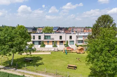 an aerial view of a park with benches and buildings at NIEUW - De Grenspaal WEST 6P 5 min Maastricht - Sauna - Laadpaal in Riemst