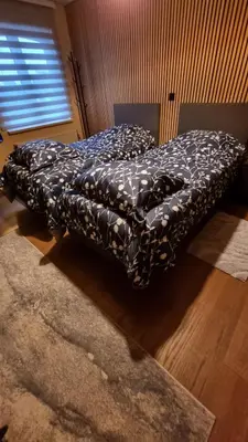 a bed sitting on the floor in a room at MARINA in Houthalen-Helchteren