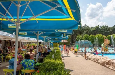 a crowd of people at a water park at Vakantie-Chalet Camping GOOLDERHEIDE met seizoensgebonden zwembad in Bocholt