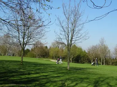 a group of people playing golf in a park at B&B Opus35 in Montzen
