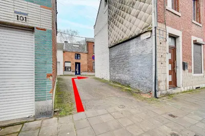 an empty alley with a red line in a building at LIÉGE - Le cocon de Chênée in Chênée