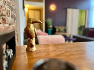 a figurine of a bird sitting on a table at Art Loft -Opéra, Saint-Lambert, Bueren in Liège