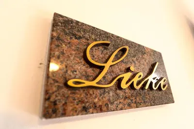 a gold sign with the word nine on it at Millenniumhoeve (Lieke) in Riemst