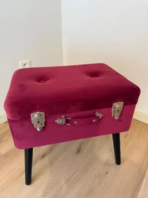 a purple ottoman with a purple blanket on top at Villa Luna in Oudsbergen