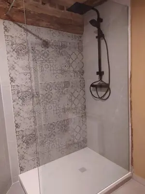 a shower with a glass door in a bathroom at Close from Ardenne - Fully renovated modern farmhouse in Baelen in Baelen