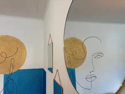 a room with a wall with hats on it at Le parfait Studio de la Cité Ardente - Central in Liège