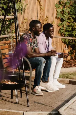 a group of three people sitting on a bench at Alivio - Thuiskomen bij jezelf op vakantie in Lummen