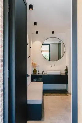 a bathroom with a sink and a mirror at Entre Nous in Herk-de-Stad