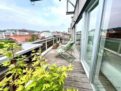 a balcony with a view of a city at Le Panoramique des Carmes - Vue Cathédrale in Liège