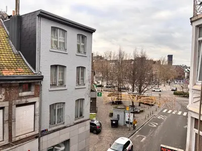 an overhead view of a city street with buildings at FourSuites Liège in Liège