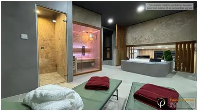 a large bathroom with a shower and a tub at Pause Thermale Suites Deluxe et Spa Privatif in Herstal