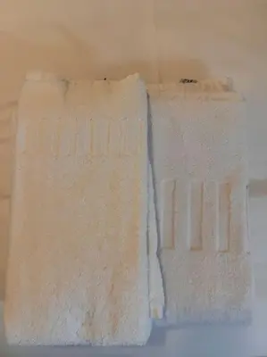 two towels are hanging on a wall at Urbanchic Appartement Evasion 3D in Liège