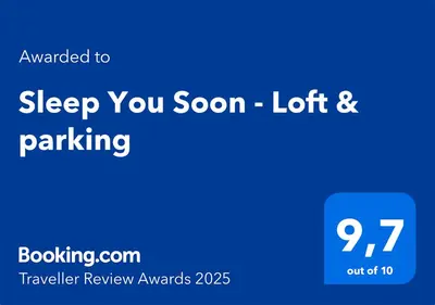 a blue screen with the words sleep you son lot and parking at Sleep You Soon - Loft & parking in Liège