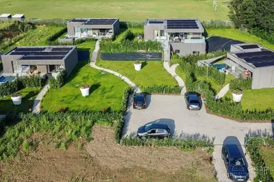 an aerial view of a house with cars parked in a driveway at Lodge 4 you gite de luxe pour 4 personnes in Verviers
