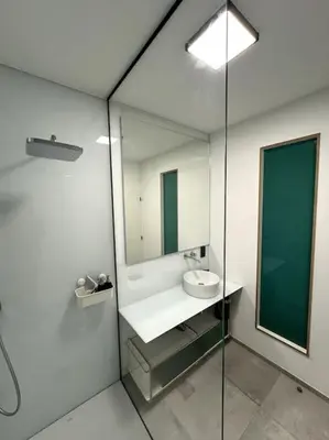 a bathroom with a sink and a mirror at lOFT 202 in Liège