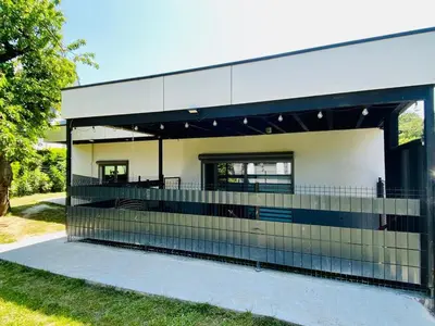 a modern house with a black and white facade at Loft de Waroux in Awans