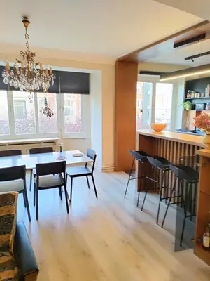 a dining room with a table and chairs at LifeinLiege in Liège