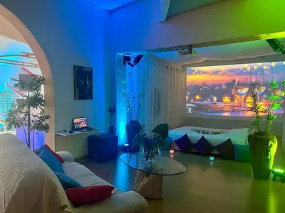 a living room with a couch and a table at Le Rêve de Narcisse in Fléron