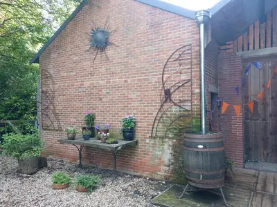 a brick wall with a spider on the side of it at B&B Halen in Halen
