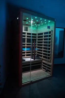 a bathroom with a glass shower with at SpaNChill in Herstal