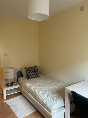 a room with a bed in the corner of a room at Comfortable stay in Tongeren in Tongeren
