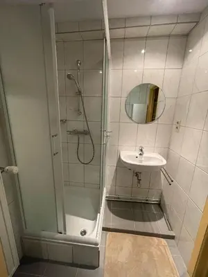 a bathroom with a shower and a sink at Comfortable stay in Tongeren in Tongeren