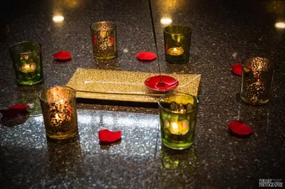a group of glasses with candles on a table at Le Gate One in Herbesthal