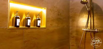 a bathroom with a shelf with four bottles of wine at Luxury Loft Home Sweet House in Oupeye