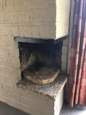 a brick brick fireplace with a brick at Bungalow in Sonnevijver - Hoge kempen in Lanaken