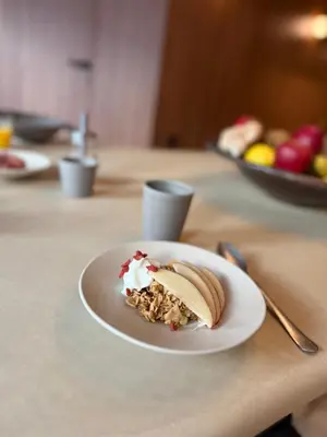 a plate of food with a sandwich on a table at Door9 Hasselt - Digital Hotel & Restaurant in Hasselt