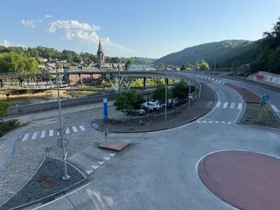 an empty street with a bridge over a road at Bel appart - Tilff in Tilff