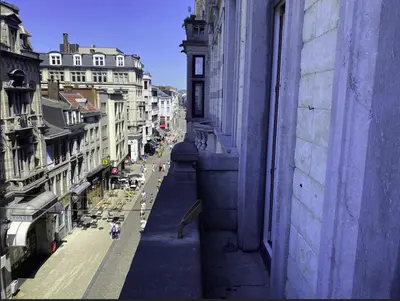 a view of a city street from a building at Liège Centre-ville by WelcHome in Liège