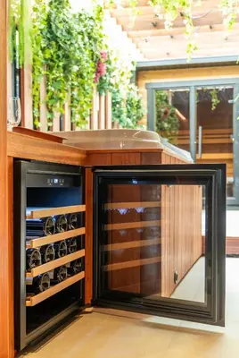 a wine rack with wine bottles inside of it at Suite Escape in Hasselt
