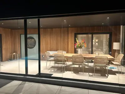 a dining room with a table and chairs at Inspire Residence and private Wellness in Tongeren