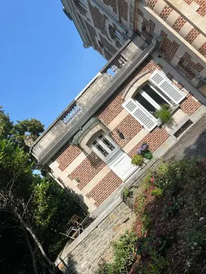 an overhead view of a brick building with two windows at Chez Léopold in Verviers