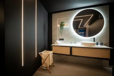 a bathroom with a sink and a mirror at Suite Soma in Bassenge