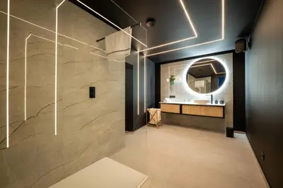 a bathroom with a sink and a mirror at Suite Soma in Bassenge