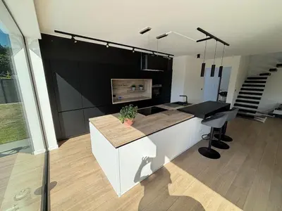 a kitchen with a counter and a counter top at Modern, child-friendly country house