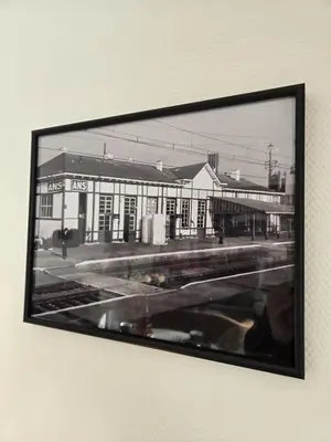 a black and white picture of a train station at Vintage Station in Ans