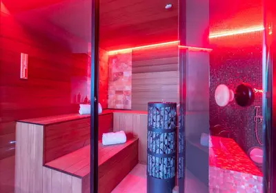 a red bathroom with a shower with red lighting at Temple Torii in Crisnée
