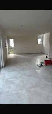 a large empty room with a red object on the floor at Grand-Prix Spa-Francorchamps 2026 in Jalhay
