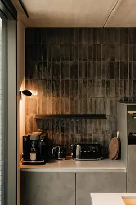 a kitchen with a counter with two toasters on it at Coliving - Bord de Meuse - L'échappée Mosane in Oupeye
