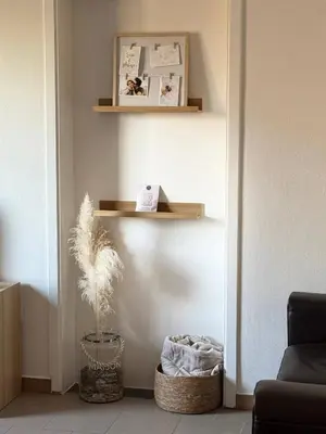 a living room with a shelf and a plant at Charming Apartment in Lontzen on 72 m² in Lontzen