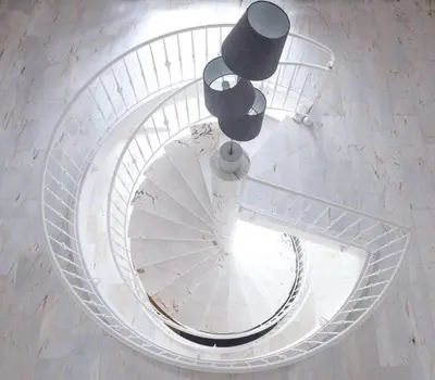 an overhead view of a spiral staircase with at Villa Bianca in Dalhem