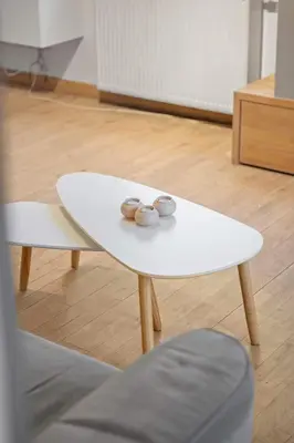 a white coffee table with two donuts on it at Ruime vakantievilla in Halen voor 12 personen in Halen