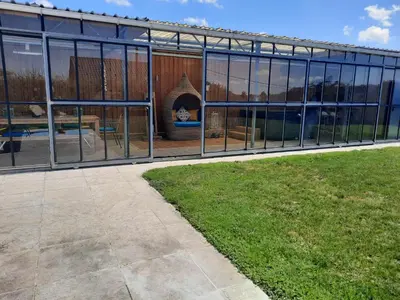 an external view of a building with a fireplace at Holiday Home Mooi - Voeren in Voeren