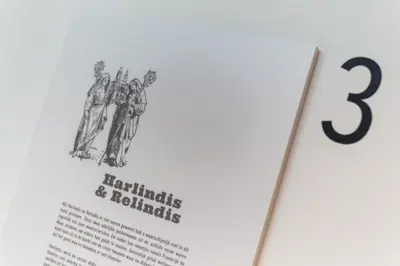 a page of a book with the number three at De Sjeiven Dorpel in Maaseik